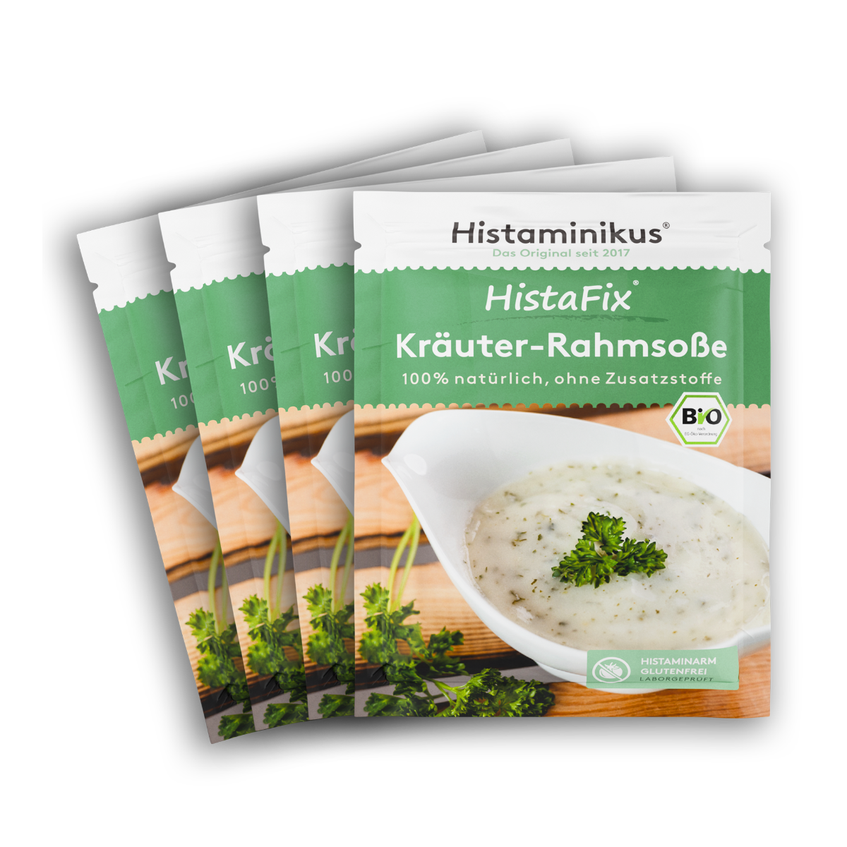 Vier nebeneinander gelegte HistaFix-Beutel „Kräuter-Rahmsoße“ von Histaminikus, mit cremiger weißer Soße und Petersilie auf der Vorderseite, grün-weißes Verpackungsdesign mit Bio-Siegel und Hinweis „histaminarm, glutenfrei, laborgeprüft“.