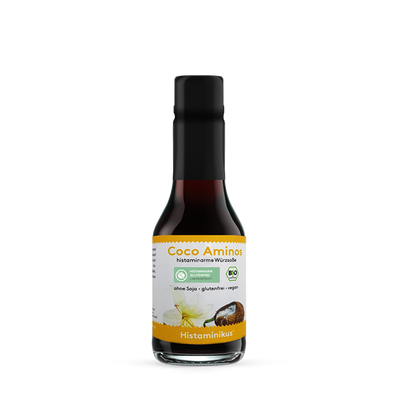 Kleine Glasflasche (145 ml) mit schwarzem Deckel und Etikett „Coco Aminos – histaminarme Würzsoße“. Bio- und histaminarm-Siegel, Aufschrift: ohne Soja, glutenfrei, vegan.
