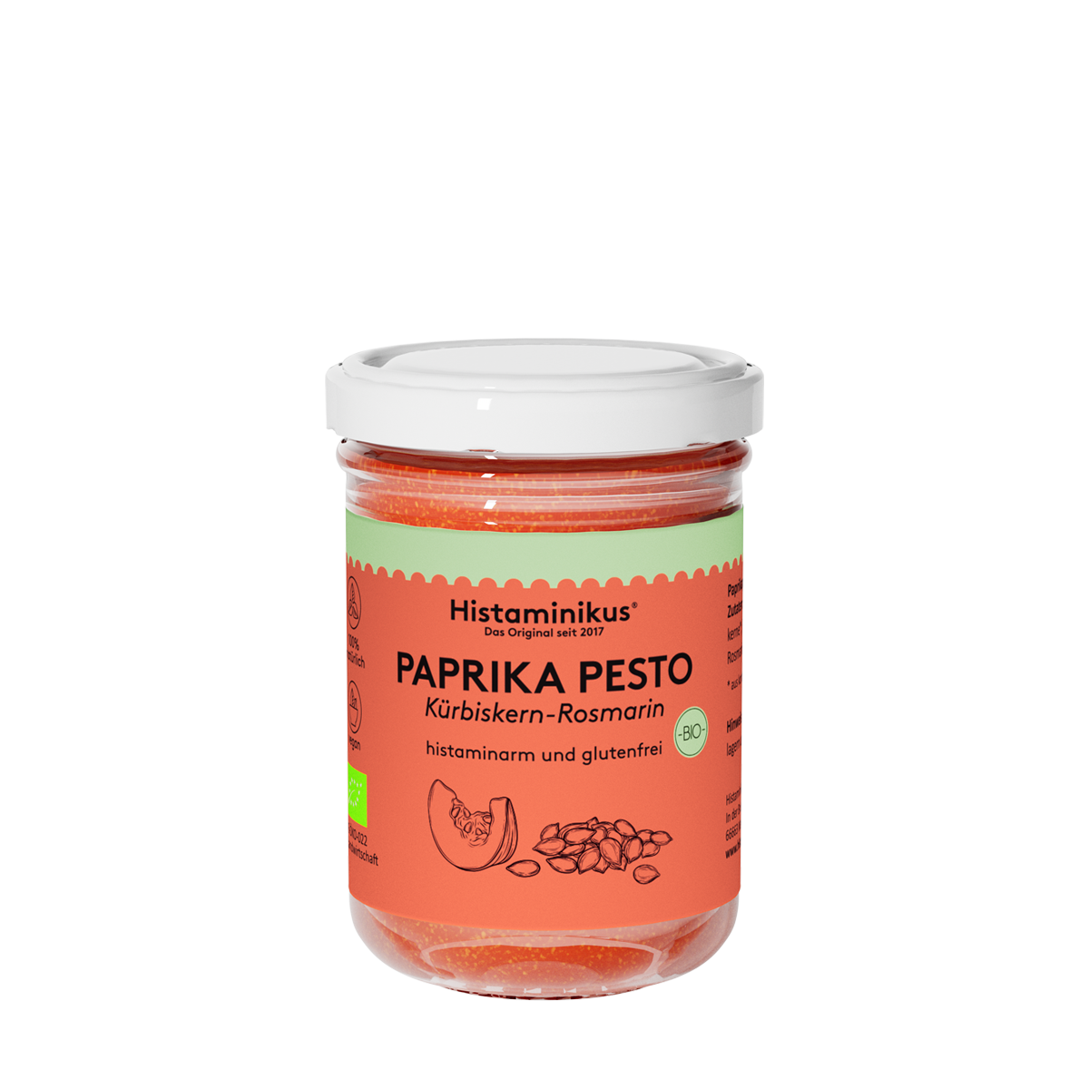 Glas mit dem Aufdruck Paprikapesto und weißem Deckel. Der Inhalt ist orange und wird als histaminarm und glutenfrei bezeichnet. Unter dem Paprikapesto steht "Kürbiskern-Rosmarin" und es ist eine kleine Zeichnung einer Scheibe Kürbis und Kürbiskernen zu sehen.
