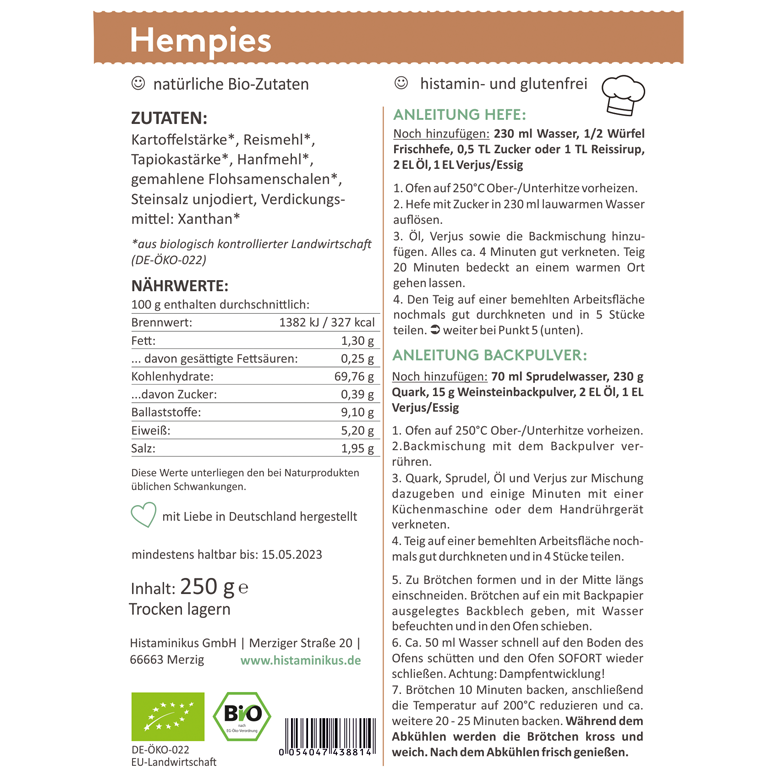 Etikett mit Zutaten- und Backanleitung für „Hempies“. Links Zutatenliste mit Kartoffelstärke, Reismehl, Hanfmehl, Flohsamenschalen u.a., sowie Nährwerte pro 100 g. Rechts zwei Zubereitungsvarianten: mit Hefe oder Backpulver. Angaben zu Backzeiten, Temperaturen und zusätzlichen Zutaten. Unten Bio-Siegel und Herstellerinfo.