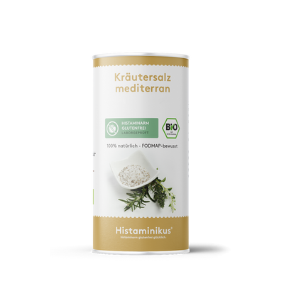 Weiße Gewürzdose mit goldenem Deckelrand und der Aufschrift „Kräutersalz mediterran“. Darunter ein Etikett mit den Aufschriften „Histaminarm glutenfrei – Laborgeprüft“ und „Bio“. In der Mitte ein Bild mit Schälchen voll Kräutersalz, darunter frische mediterrane Kräuter. Unten goldener Bereich mit dem Logo von Histaminikus.