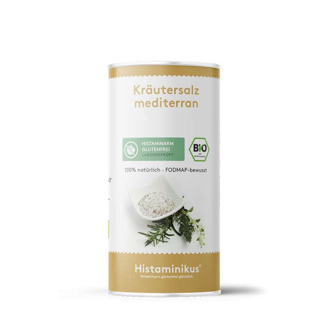 Weiße Gewürzdose mit goldenem Deckelrand und der Aufschrift „Kräutersalz mediterran“. Darunter ein Etikett mit den Aufschriften „Histaminarm glutenfrei – Laborgeprüft“ und „Bio“. In der Mitte ein Bild mit Schälchen voll Kräutersalz, darunter frische mediterrane Kräuter. Unten goldener Bereich mit dem Logo von Histaminikus.
