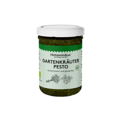 Histaminikus Bio-Gartenkräuter-Pesto im Glas – histaminarm und glutenfrei, mit grünem Kräuterpesto, weißem Schraubdeckel und hellgrünem Produktetikett.

