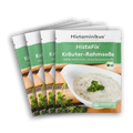 Vier nebeneinander gelegte HistaFix-Beutel „Kräuter-Rahmsoße“ von Histaminikus, mit cremiger weißer Soße und Petersilie auf der Vorderseite, grün-weißes Verpackungsdesign mit Bio-Siegel und Hinweis „histaminarm, glutenfrei, laborgeprüft“.