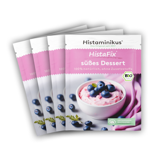 4 Päckchen vom süßssen Dessert hintereinander aufgereiht