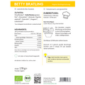 Verpackungsrückseite des Produkts „Betty Bratling“. Oben gelber Streifen mit Titel und Beschreibung „Vegane Bratlingmischung“. Links Zutatenliste, Nährwerte und Hinweise wie „mit Liebe in Deutschland hergestellt“. Rechts Zubereitungsschritte mit Text und Grafik: Karotten raspeln, mit Mischung und Wasser mischen, kneten, ziehen lassen, Bratlinge formen und anbraten. Unten Tipp: anderes Gemüse möglich. Bio-Siegel, Gewicht (178 g) und Herstelleradresse.