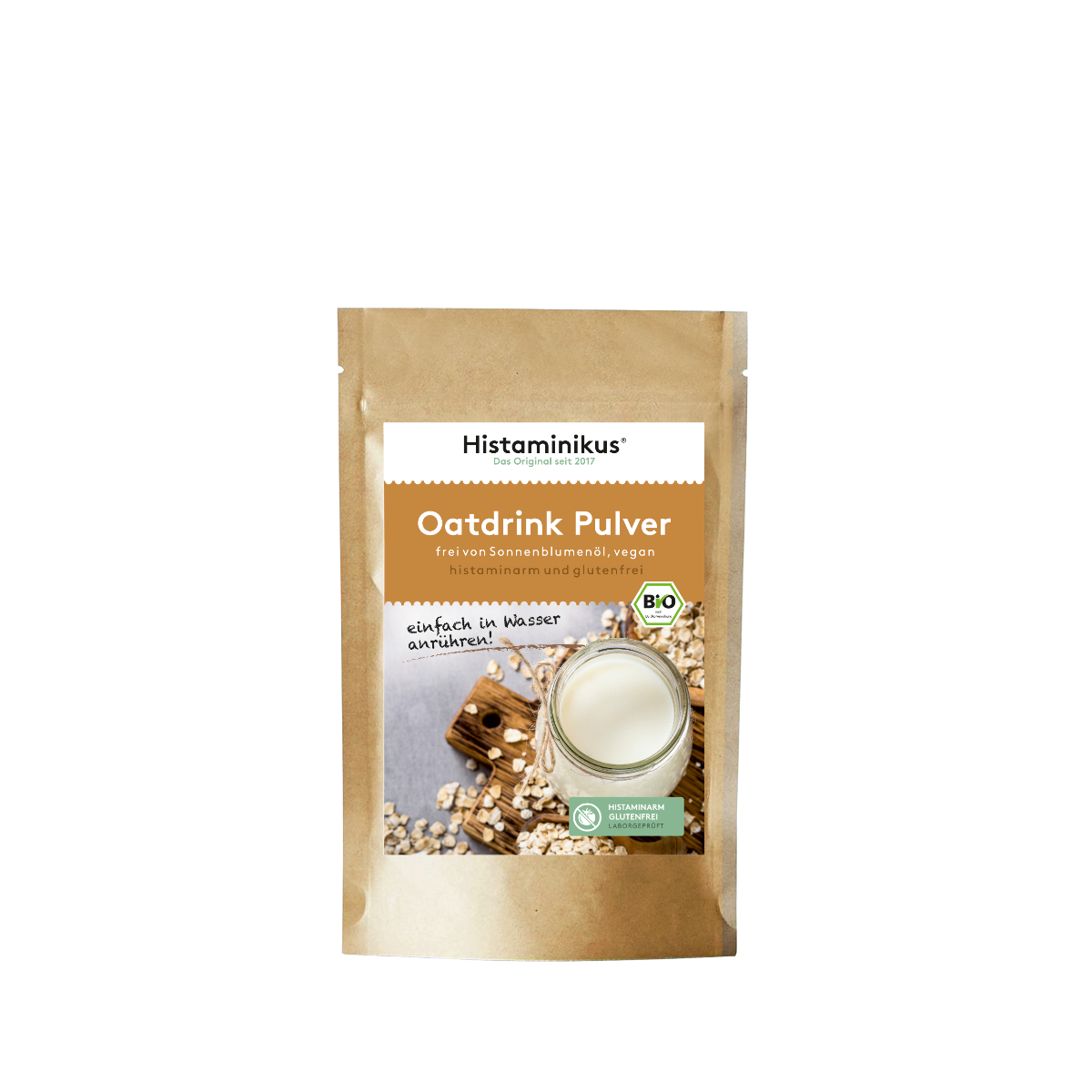 Braune Standbeutelverpackung von Histaminikus Oatdrink Pulver mit Glas Hafermilch und Bio- sowie Histaminfrei-Siegel auf dem Etikett.