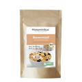 Braune Standbodenverpackung mit Etikett des Produkts „Basenmüsli“. Aufschrift „Histaminikus, das Original seit 2017“. Darunter Produktname „Basenmüsli – Bio-Müslimischung“. Text „histaminarm und glutenfrei“. Abgebildet ist eine weiße Schale mit Müsli, Milch wird hineingegossen. Im Müsli sind dunkle Beeren zu erkennen. Links daneben steht „Dein basischer Start in den Tag!“. Bio-Siegel und ein grünes Icon mit „Histaminarm & Glutenfrei laut Rezeptur“.