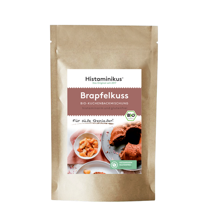 Braune Standbodenverpackung mit Etikett „Brapfelkuss – Bio-Kuchenbackmischung“. Auf dem Etikett ein Gugelhupf, Apfelstückchen, Bio- und histaminarm-Label.