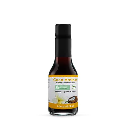 Kleine Glasflasche (145 ml) mit schwarzem Deckel und Etikett „Coco Aminos – histaminarme Würzsoße“. Bio- und histaminarm-Siegel, Aufschrift: ohne Soja, glutenfrei, vegan.