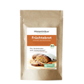 Braune Papierverpackung mit weißem Etikett. Produktname „Früchtebrot“ in orangener Schrift, darunter „süße Bio-Backmischung, histaminarm und glutenfrei“. Foto eines angeschnittenen Früchtebrots auf Holzbrett, mit Bio-Siegel und Slogan „Für Süßschnuten und Leckermäuler!“