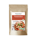 Brauner Standbodenbeutel mit zentralem, weiß-rot gestaltetem Etikett von Histaminikus; Produktname „Pizzaminikus – Bio-Pizzateig-Mischung“. Unterzeile „histaminarm und glutenfrei, mit Hefe oder Backpulver backen“. Rechts am Etikett ein grünes BIO-Siegel. Darunter Produktfoto: runde Pizza, in Stücke geschnitten, mit weißem Belag und Basilikum; daneben handschriftlicher Spruch „Pizzaglück in jedem Stück!“. Unten rechts ein grünes Siegel „Histaminarm – Glutenfrei – Laborgeprüft“.